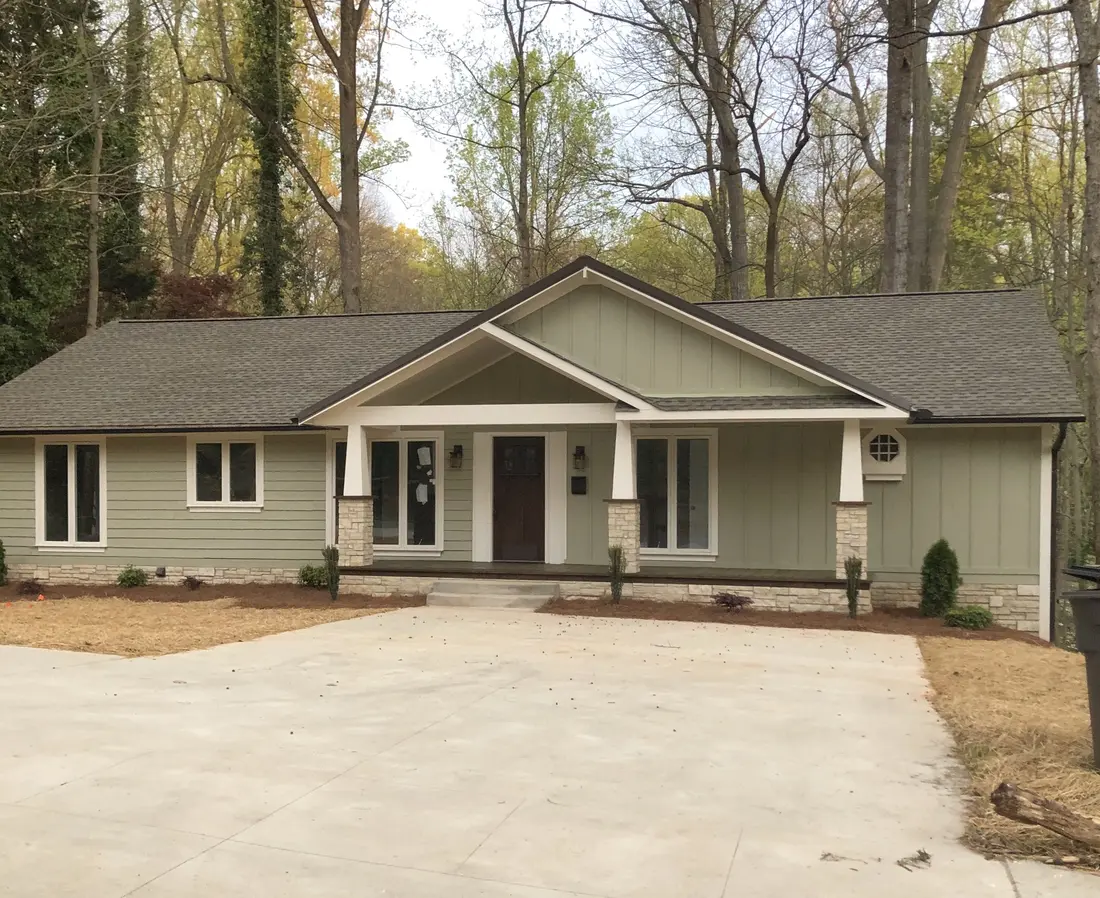 Completed Harvest exterior renovation with a covered entry